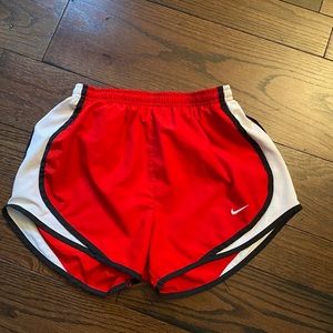Red Nike shorts